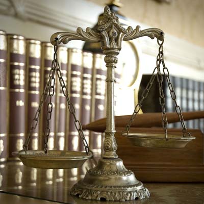 Scales of justice and legal reference books